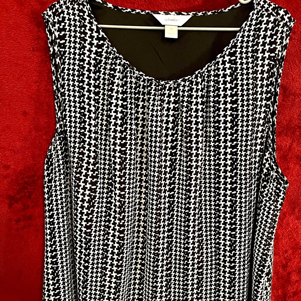 CJBank blouse; sleeveless.